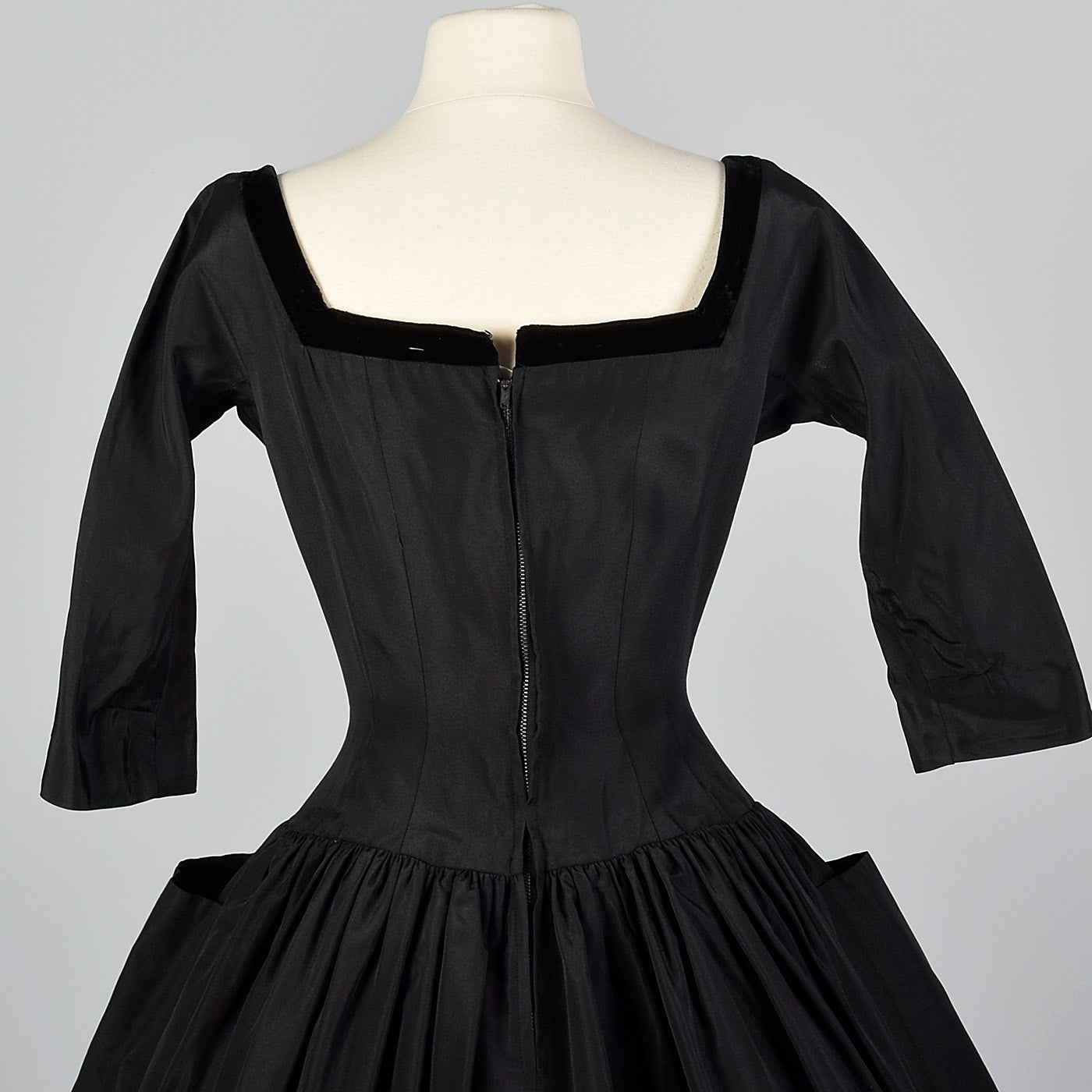 1950s Black Dress with Full Circle Skirt and Patch Pockets