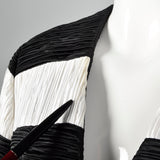 1980s Elegant Pleated Skirt Suit