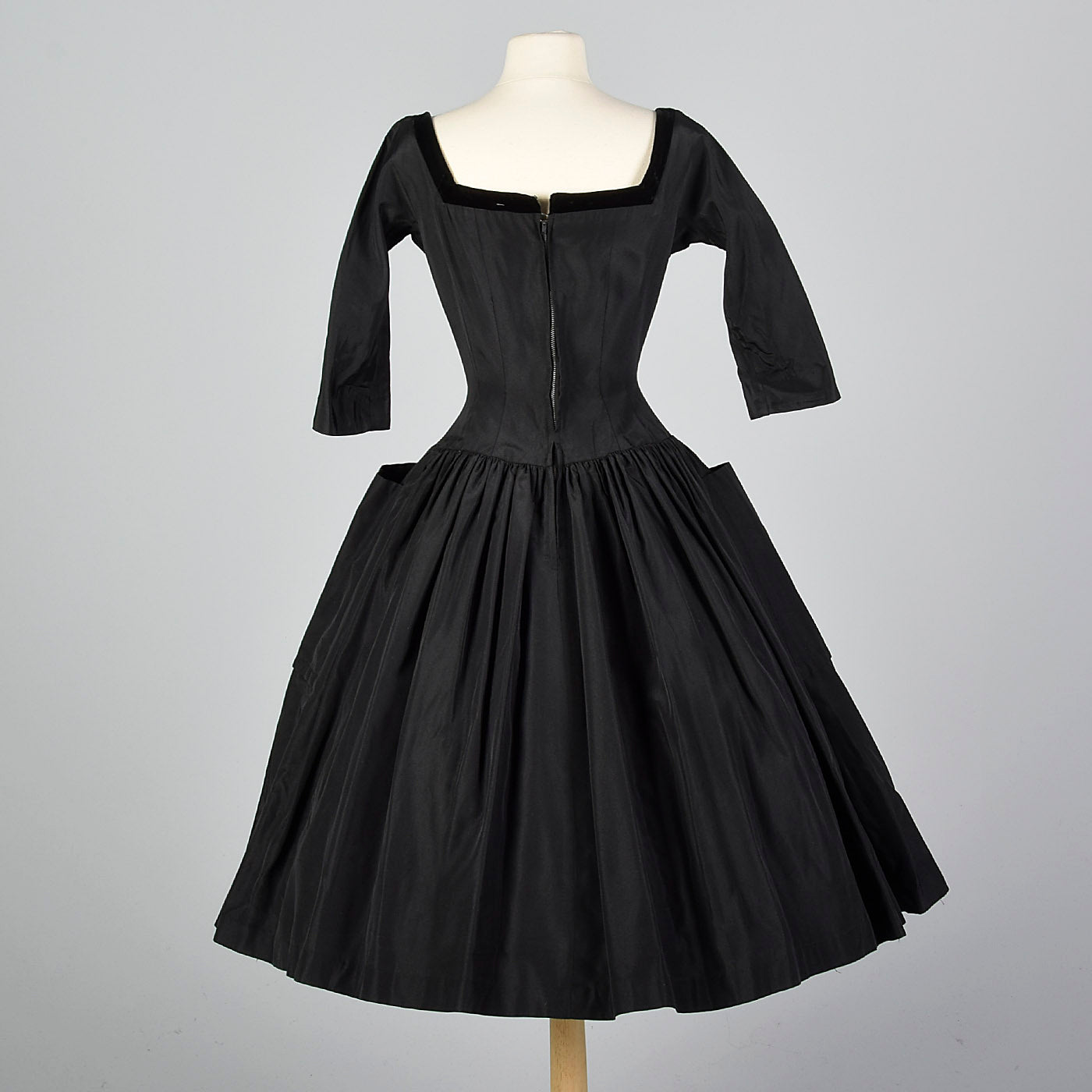 1950s Black Dress with Full Circle Skirt and Patch Pockets