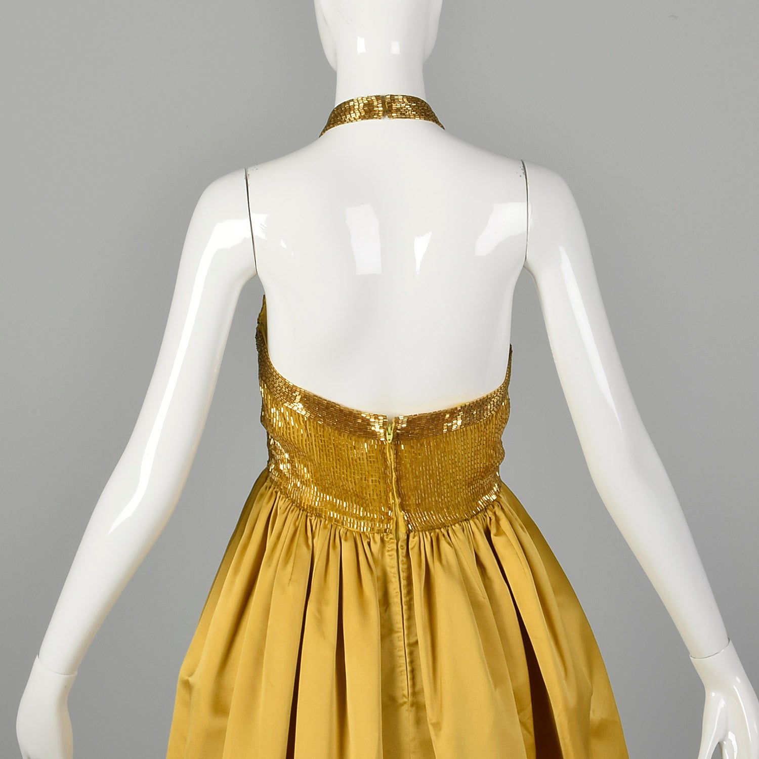 Small 1970s Gold Beaded Backless Halter Ball Gown