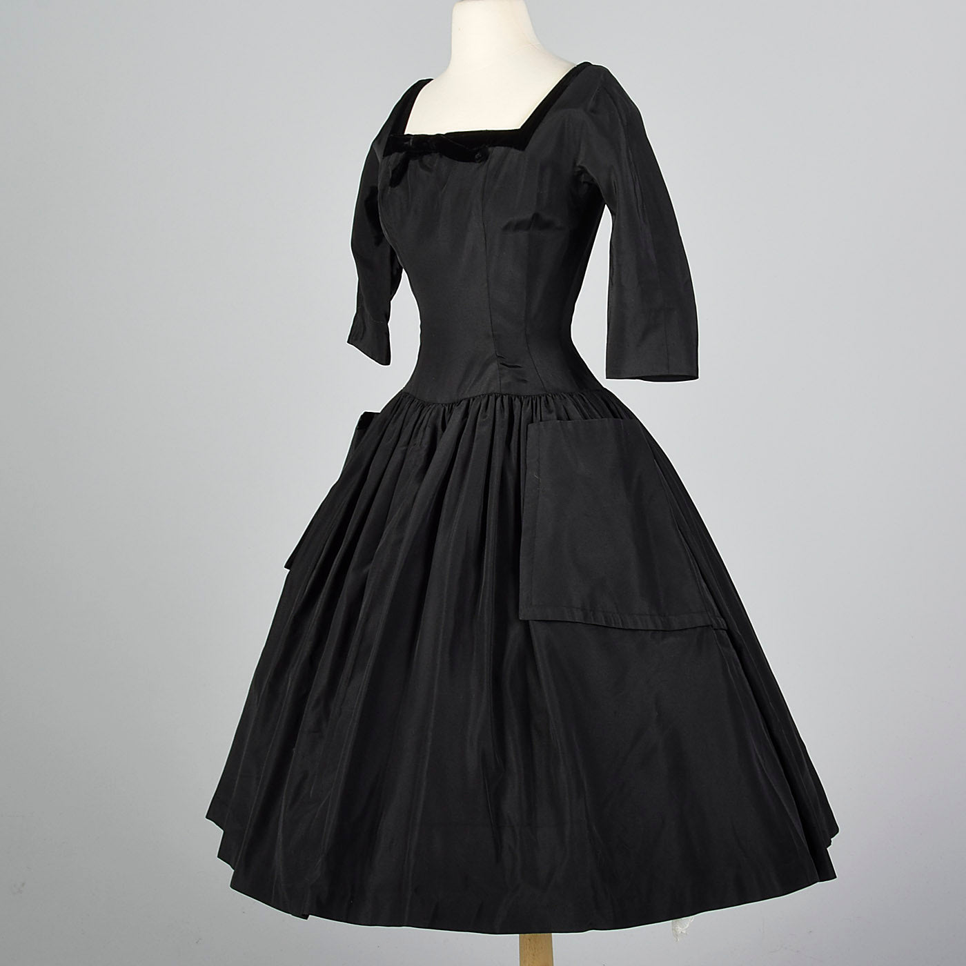 1950s Black Dress with Full Circle Skirt and Patch Pockets