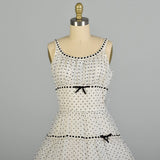 Medium 1950s Black & White Sleeveless Polka Dot Fit & Flare Party Dress