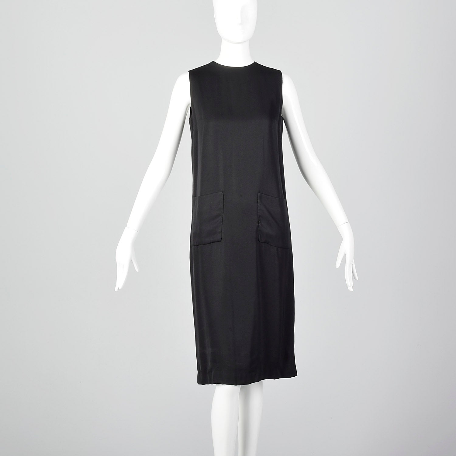 Small 1960s Sleeveless Black Dress