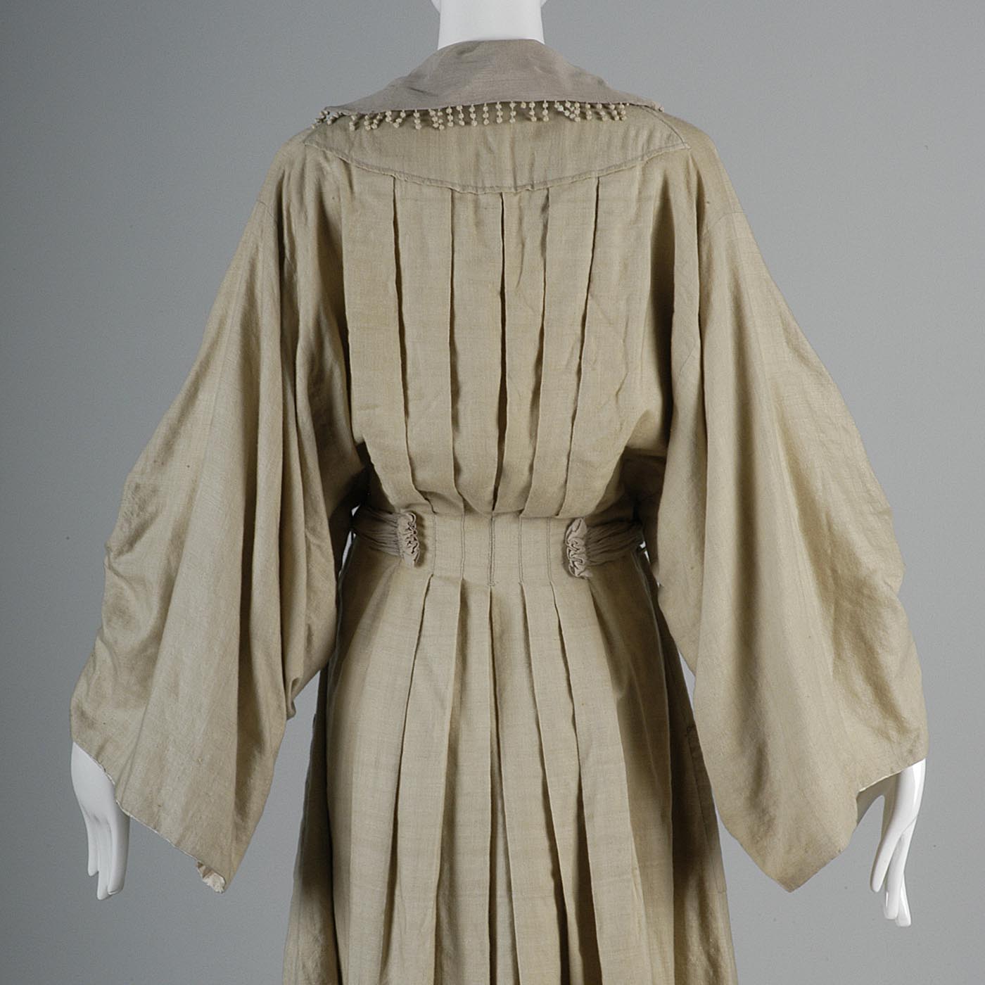 Edwardian Walking Coat with Dramatic Sleeves and Pleated Back